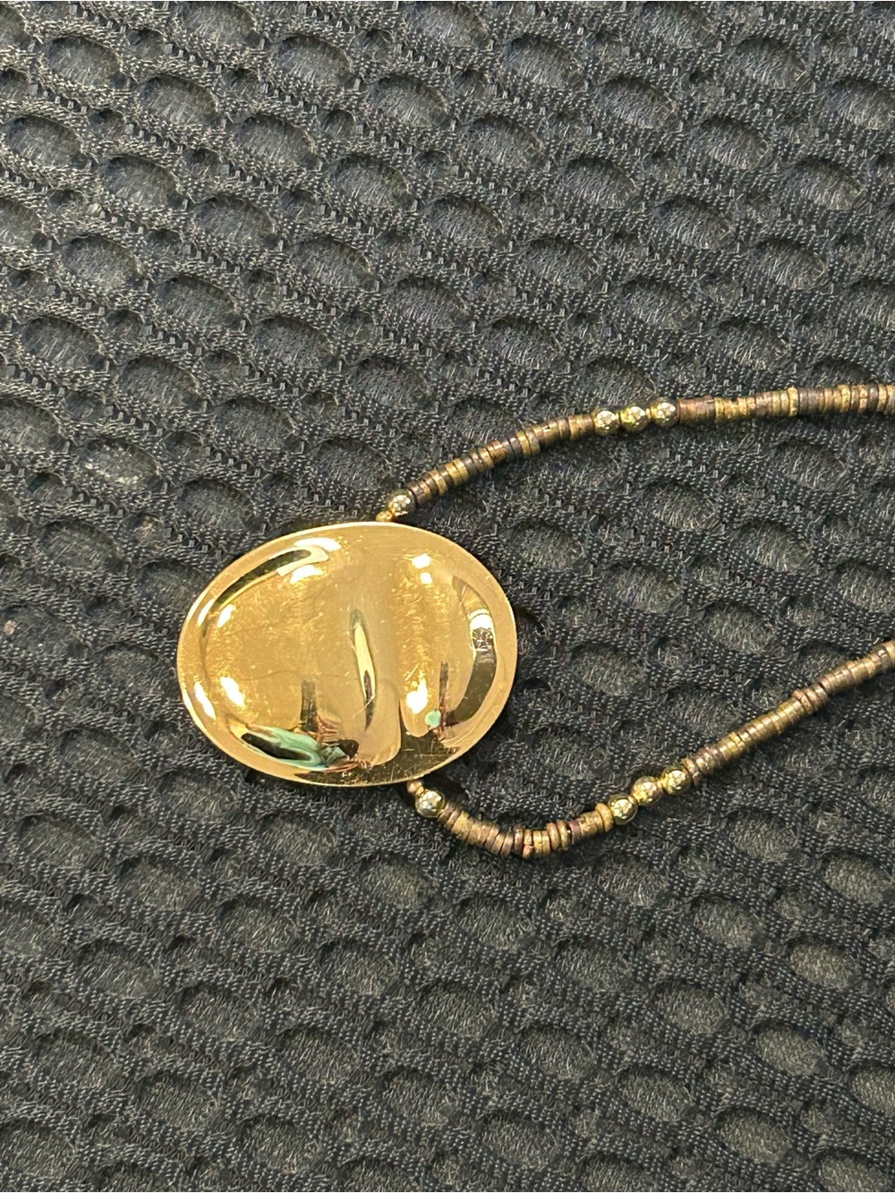 Authentic signed Carlton Ridge gold scarab pendant.   Has gold/bronze accents.